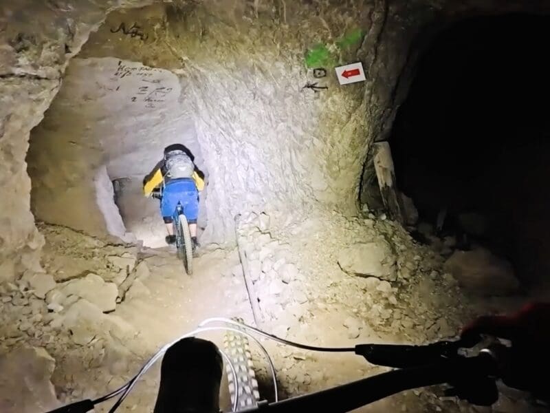 Riding through an abandoned mine in Slovenia.